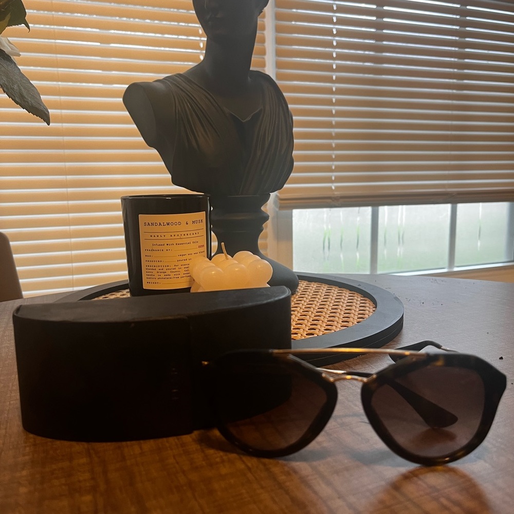 black circle/angular prada sunglasses